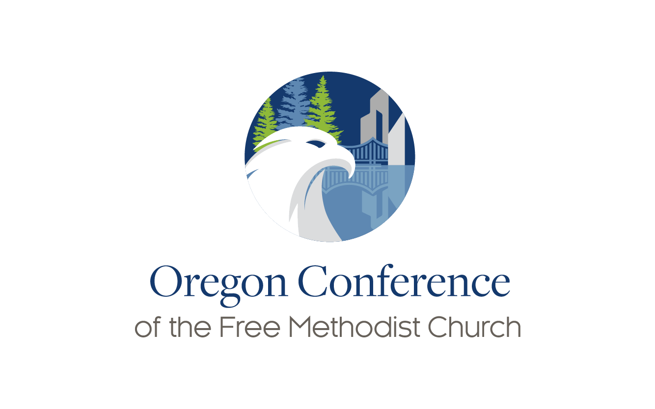 Oregon Conference of the Free Methodist Church eagle set against city and trees background